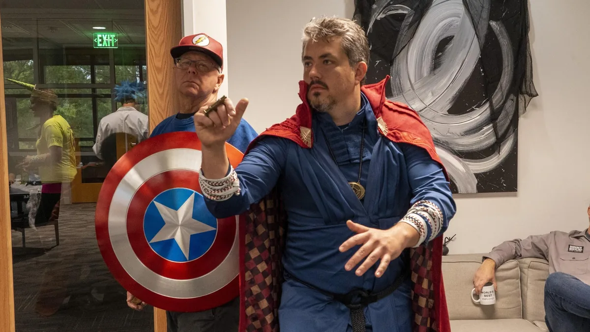 Keno Vigil and family in elaborate superhero Halloween costumes