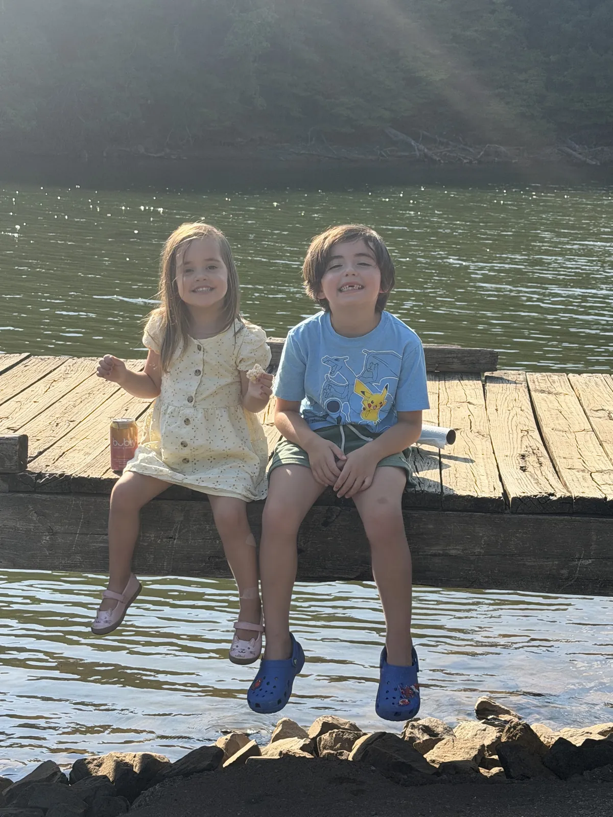 Keno Vigil's kids on a lakeside dock