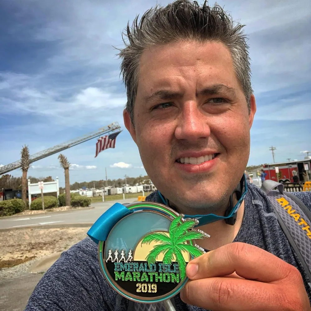 Keno Vigil after completing a marathon in 2019